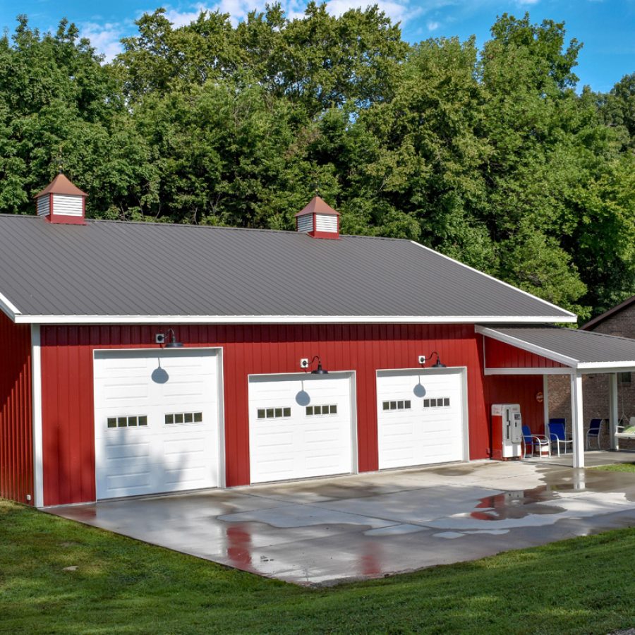new garage with black metal roof