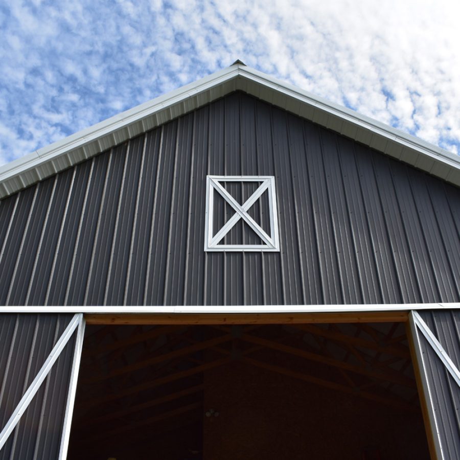gray metal siding with white metal trim