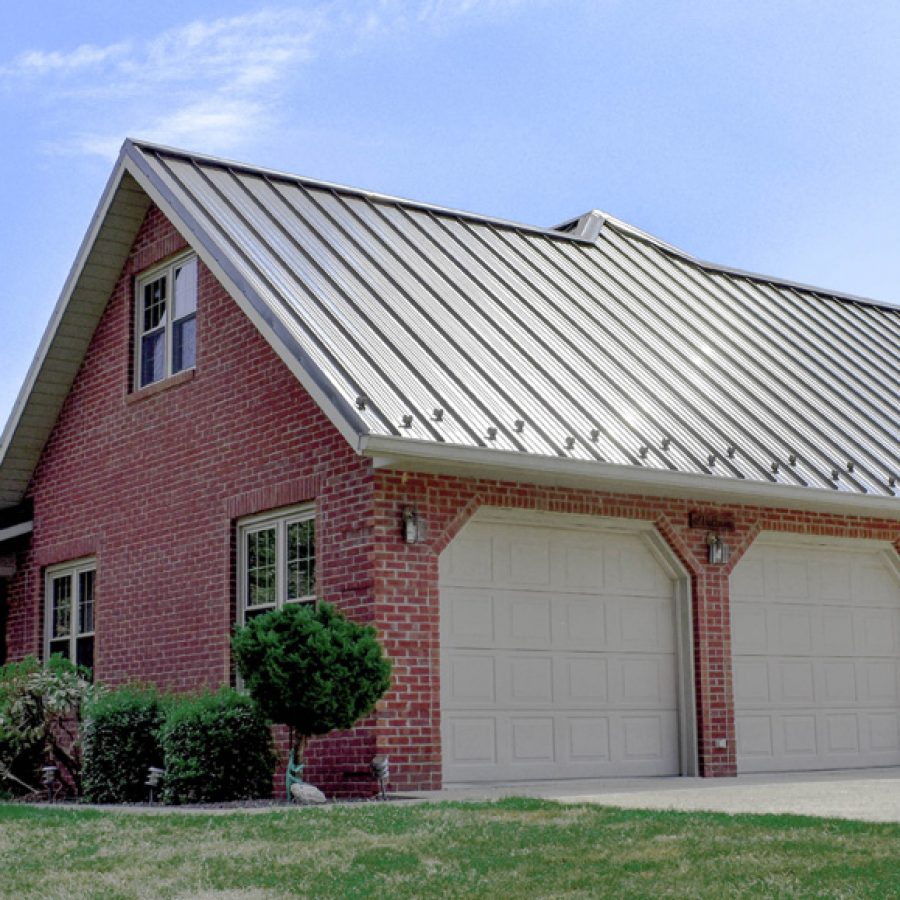 brick garage with attached sunroom
