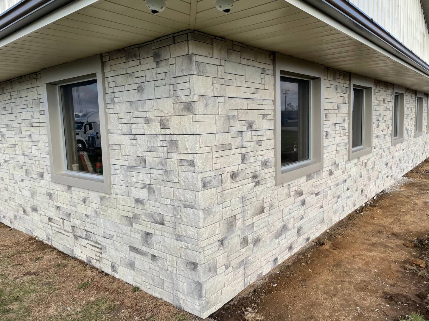 DIY Stone Veneer on House Exterior